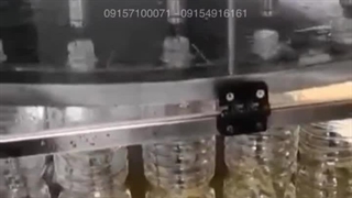 پرکن ۱۲ نازل اتوماتیک آبمیوه و آب پرتقال ساخت ماشین ساز/۰۹۱۵۷۱۰۰۰۷۱