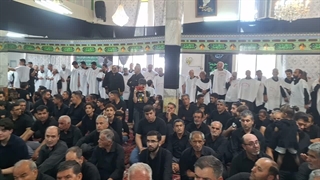 مراسم شاه حسین کفن پوش اخی جهان (1) ــ مسجد جامع ـ محرم 1405